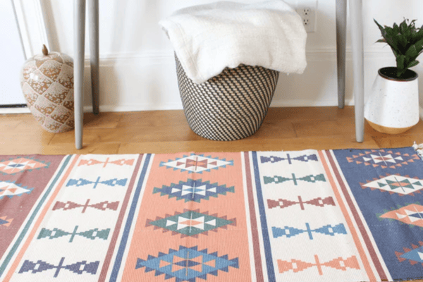 Egyptian Style Braided Rug with Obelisk Patterns and Retro Design