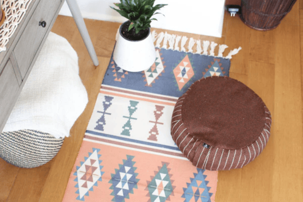 Egyptian Style Braided Rug with Obelisk Patterns and Retro Design