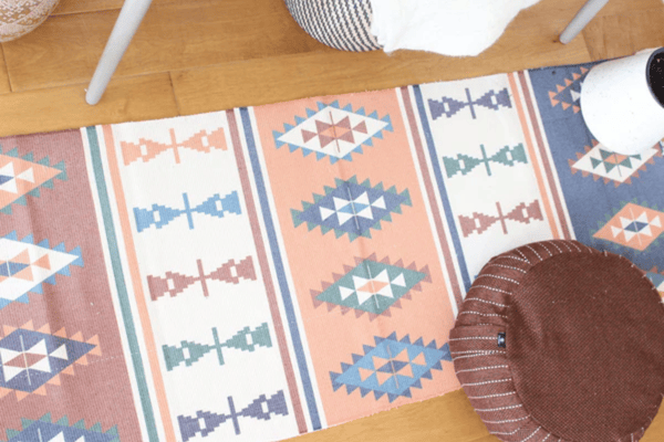 Egyptian Style Braided Rug with Obelisk Patterns and Retro Design